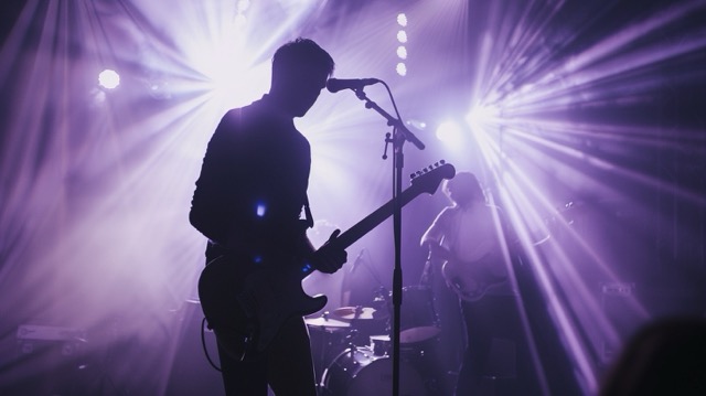 Alex Turner during Suck It and See era in denim jacket